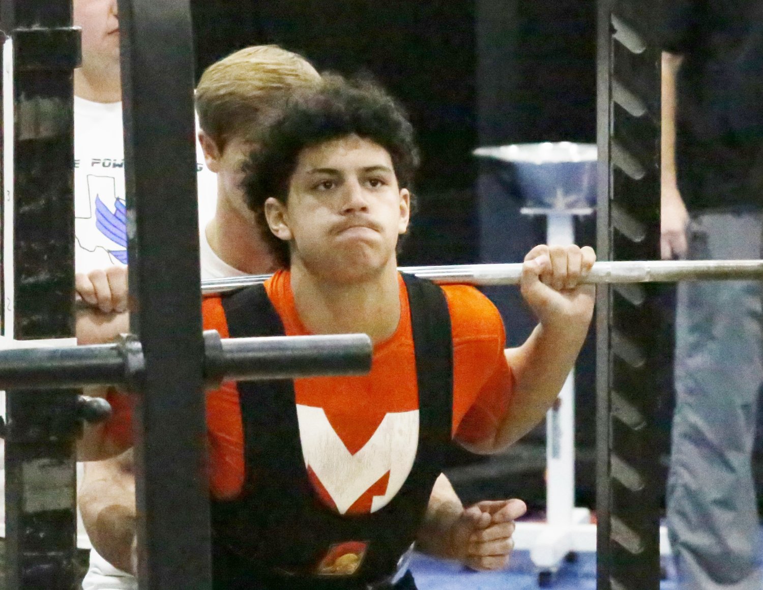 Kobe Kendrick is totally focused on the bar during a lift Saturday in Lindale. He finished sixth in the 198-pound class.